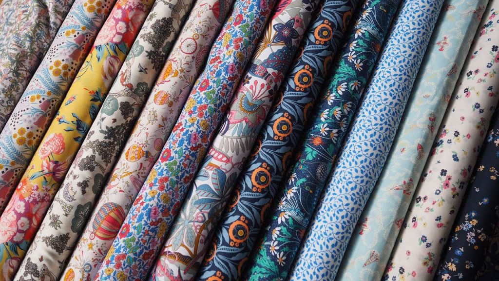 Eco-friendly cotton fabric rolls in natural tones