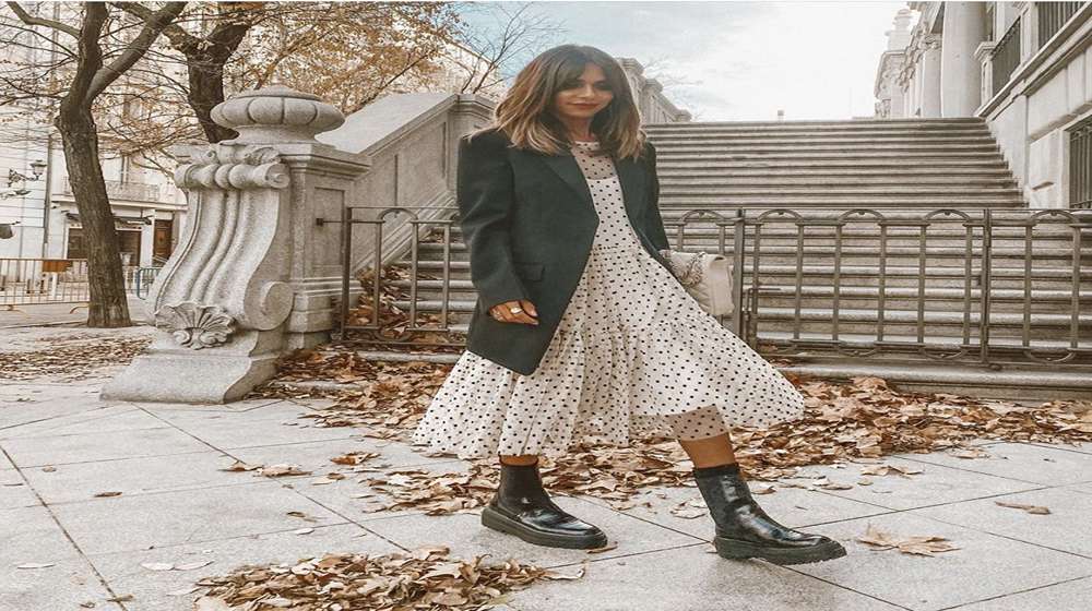 Dress based fall capsule wardrobe outfit with tights and boots
