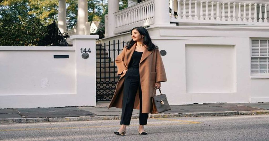 Fall capsule wardrobe: rust knit, camel coat and ankle boots