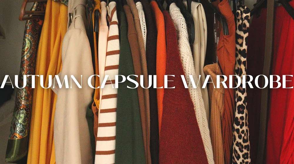 Autumn capsule wardrobe essentials on a rack