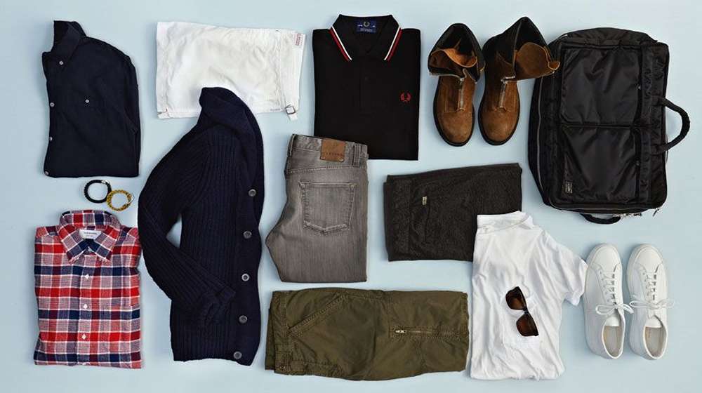 Tailored jacket fitted at the shoulder, a key piece in a minimalist wardrobe for men
