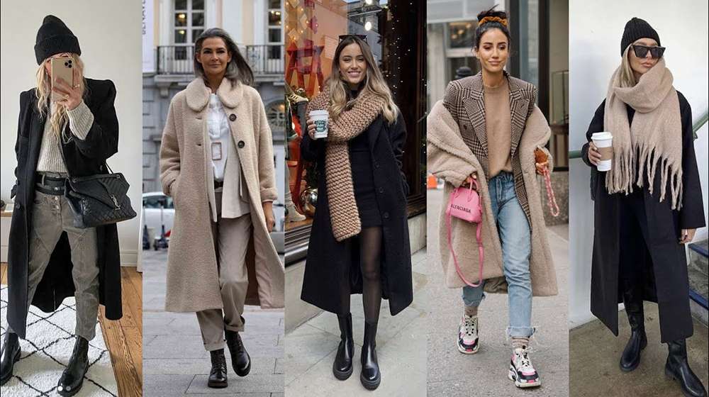 Woman wearing layered winter occasion wear with a sweater and tailored trousers